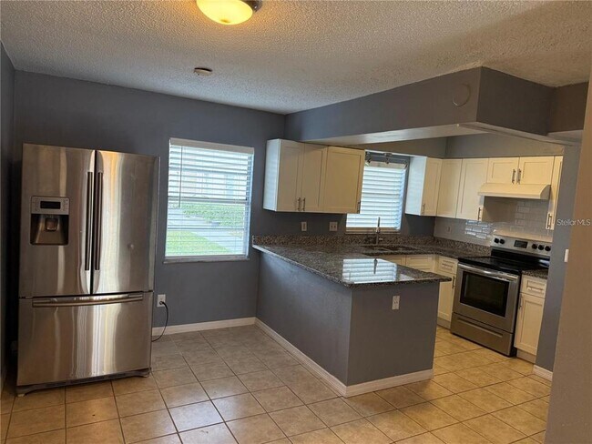 Building Photo - 7210 N Manhattan Ave