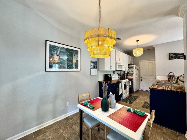Building Photo - First-Time Rental Near The Beaches! Available 08-14-26 - Attached Garage - Fenced Yard - Pet Frie...