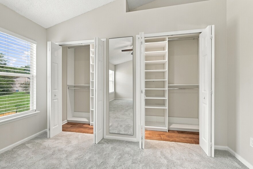 Custom primary closet system offers exceptional organization and storage. - 3622 Caroline Vale Blvd