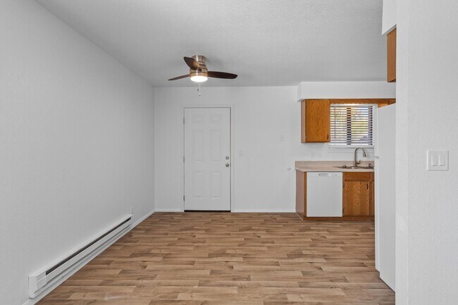 Building Photo - Fresh 2 Bed unit with giant yard, covered ...