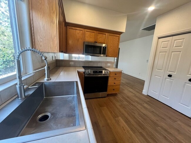 Building Photo - Three Bedroom at Dayton Valley Community