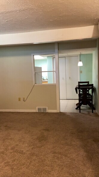 Living room to Kitchen - 2471 E Turkeyfoot Lake Rd