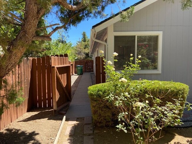 Building Photo - Coming Up Roses - NW Reno 4 Bedroom/3 Car Garage Single Story House