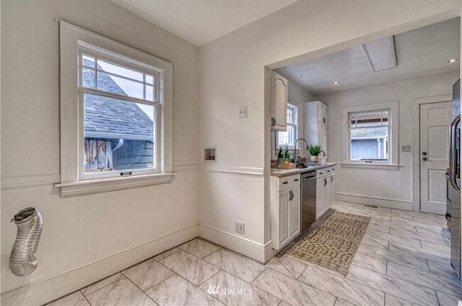 main floor laundry hook up and kitchen - 1229 7th St