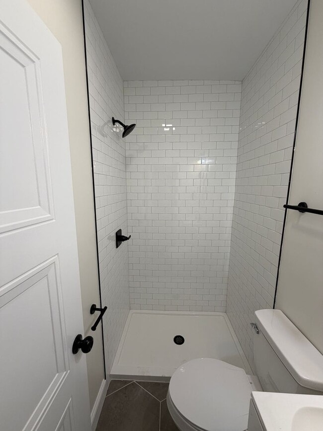 Building Photo - Rare 2-Full Bath Find: Pristine Renovation with Designer En-Suite & Granite