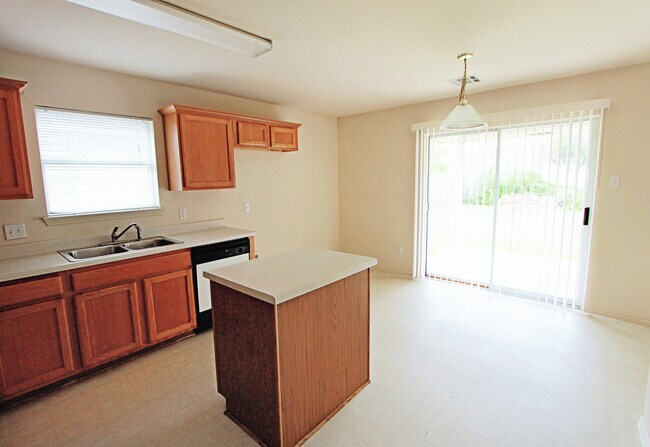 Building Photo - South Austin Home w/ Kitchen Island, Vaulted Ceilings & Mature Trees