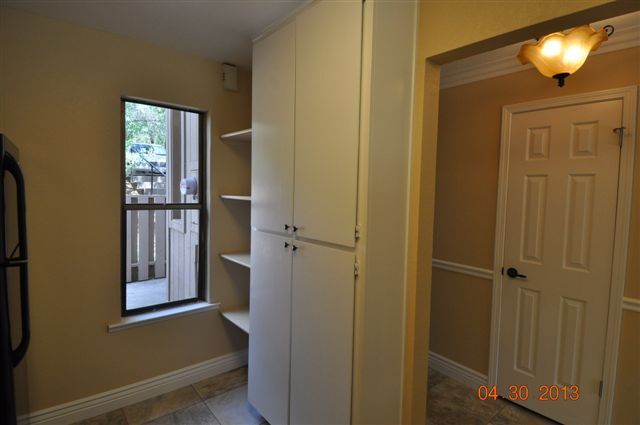 Kitchen Cabinets & shelves on the right side of the Kitchen - 13059 Lincoln Way