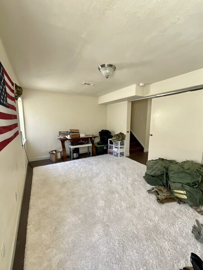 Building Photo - "Spacious 3-Bed with bonus room Sanctuary with 2.5 Baths in Fountain, CO – Your Serene Retreat Aw...
