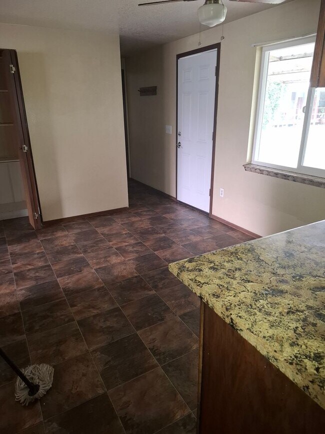Building Photo - 3 Bed, 2 bath house with  carport
