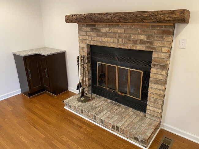 Fireplace and serving cabinet with granite top - 415 Wayne Duke Rd