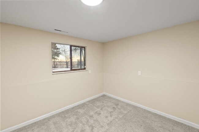 Building Photo - Spacious Split-Level Home with Finished Basement, Deck, Fenced Yard & 2-Car Garage