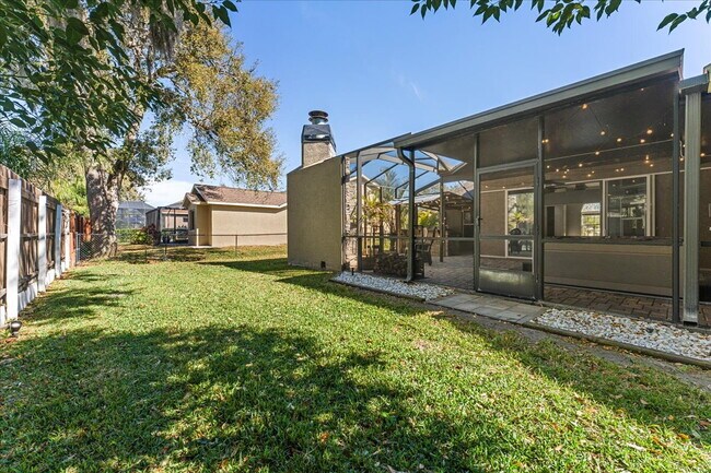 Building Photo - A vibrant 2-bedroom, 2-bathroom tropical retreat designed for both high-energy entertaining and l...