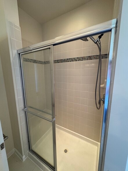 The primary bath includes a large shower with adjustable shower head. - 44520 Gray Wolf St