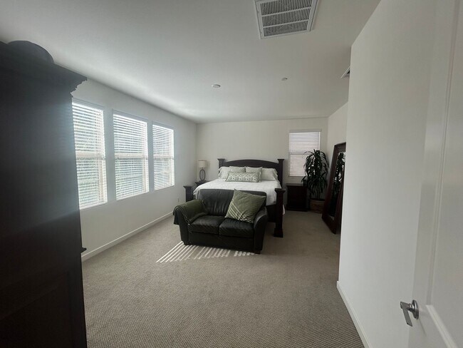 Building Photo - Modern 4 Bedroom Home with Downstairs Suite, Owned Solar & Resort-Style HOA Amenities