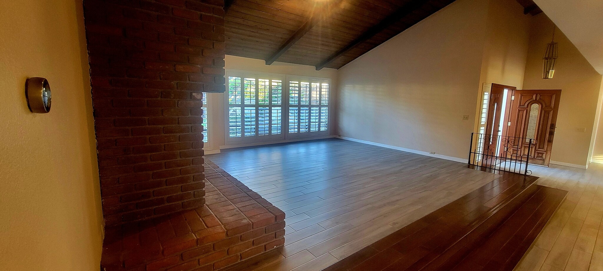 Living room with brick fireplace - 16139 Ladera Piedra Way