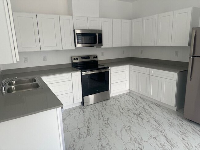 Building Photo - Now Leasing Modern Heights Apartments