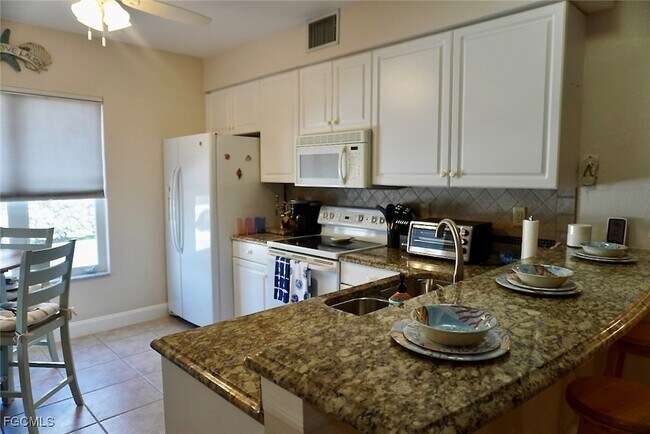 Building Photo - 5214 Chiquita Blvd S