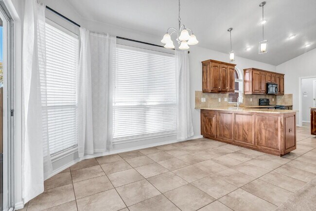 Building Photo - "Spacious 4-Bedroom Home with Chef’s Kitchen and a Master Retreat!"