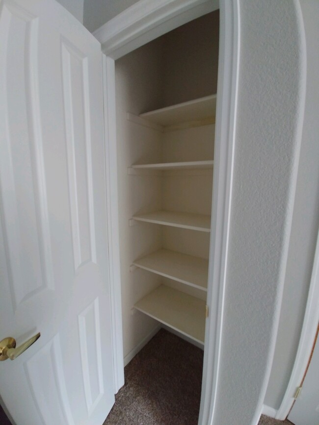 Linen Closet - 9390 W Chatfield Pl