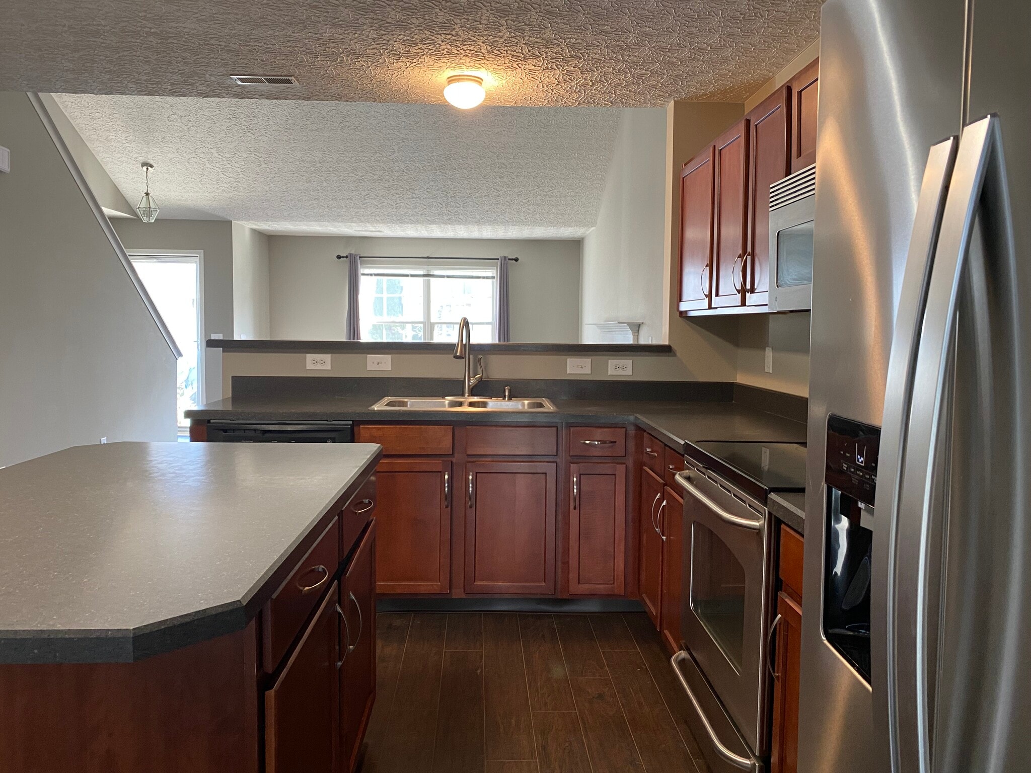 Kitchen to Living Room - 5974 Canyon Creek Dr