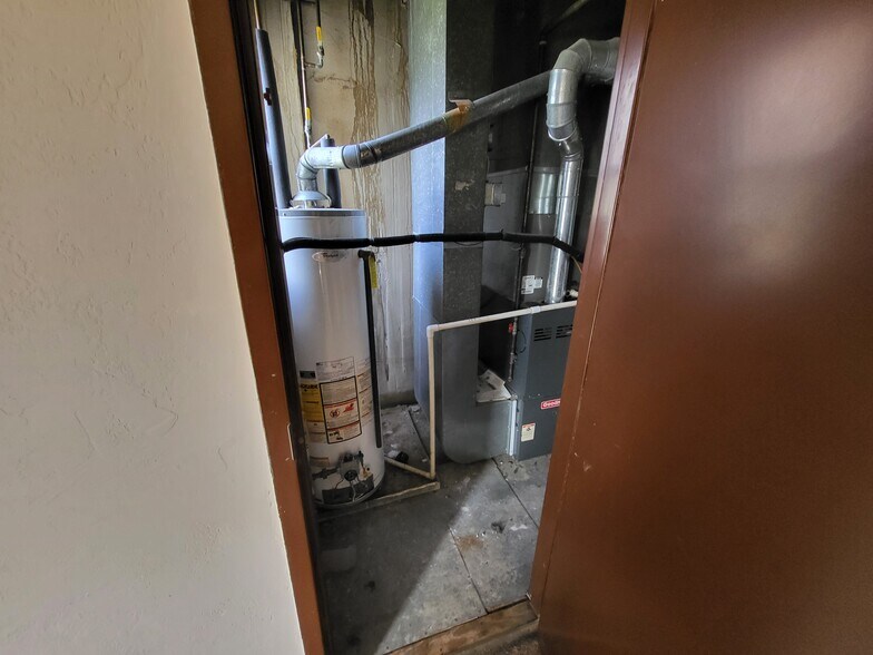 Storage, furnace, and hot water tank - 306 Amabell St