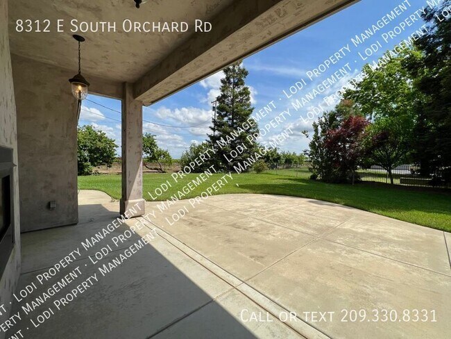 Building Photo - 8312 E Orchard Rd