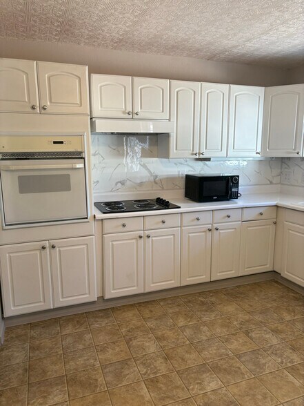 Building Photo - 6750 E Sheridan St