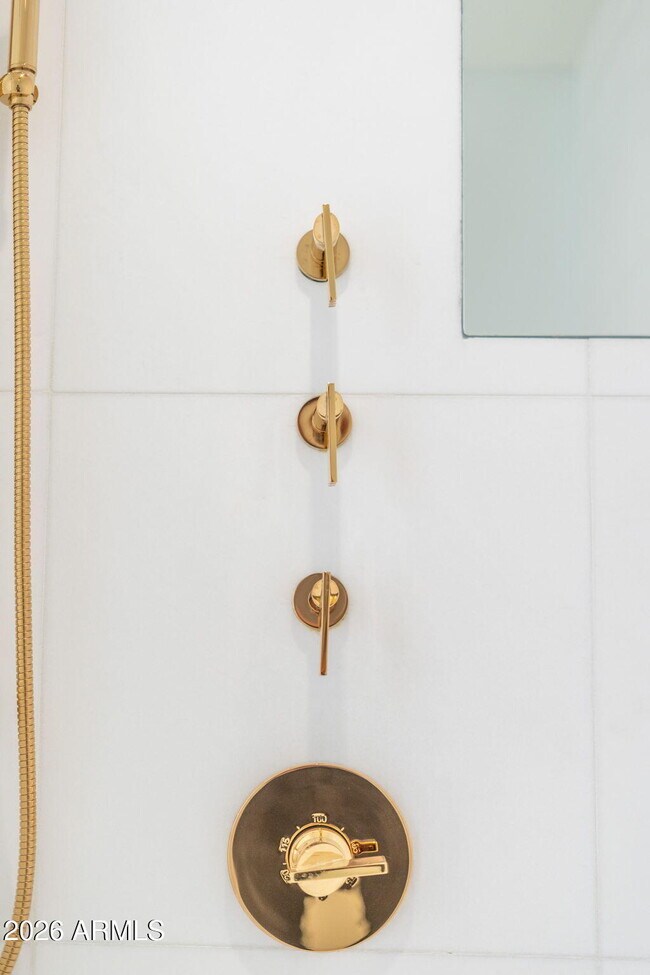 Building Photo - 6587 N Palmeraie Blvd