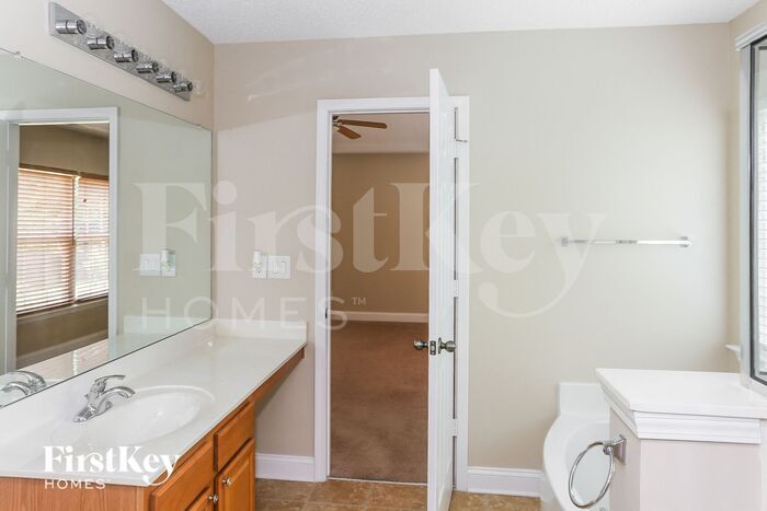 Building Photo - 9803 Falling Stream Dr