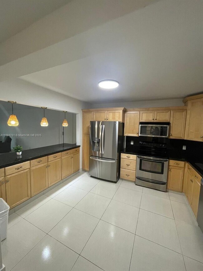 Building Photo - 8877 Collins Ave