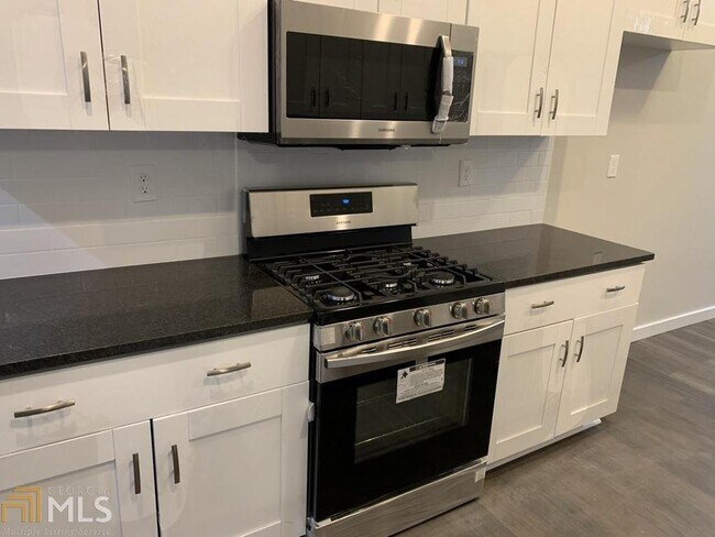 Building Photo - 6234 Collins St NE