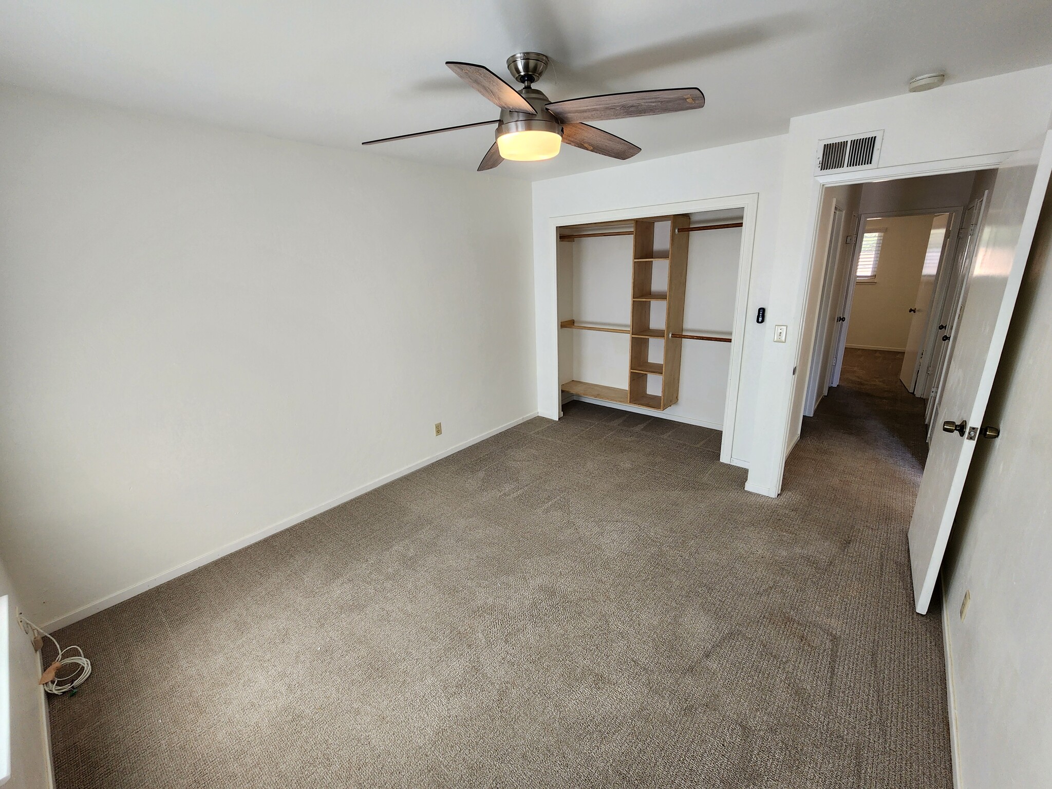 Front bedroom with built in closet organizer - 1931 De Vaca Way