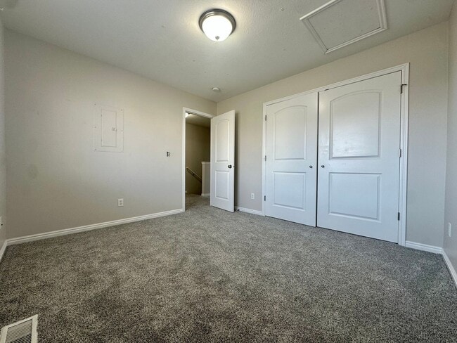 Building Photo - 2-Bedroom Townhome with Central AC and Covered Parking