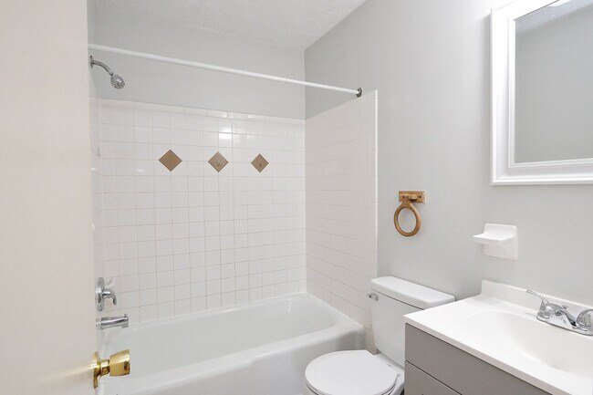 Building Photo - Small Dog-Friendly Woolen Mills Duplex Near Downtown