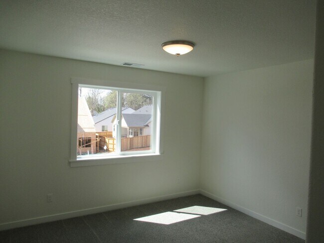 Building Photo - Three Bedroom Duplex Built in 2021