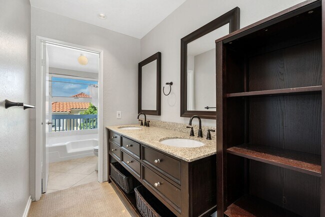 Building Photo - Coastal Elegance Meets Family Comfort in D...