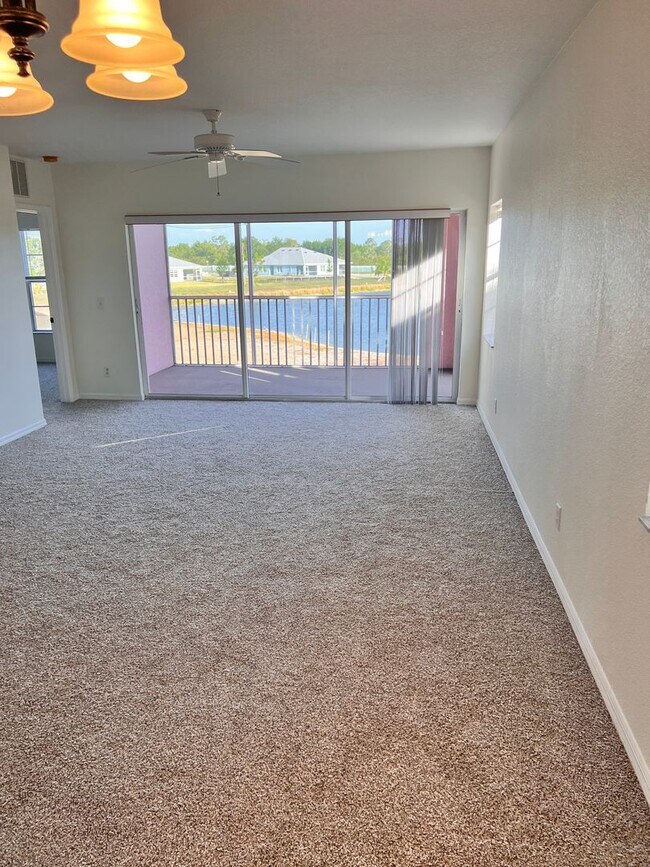 Building Photo - Annual Unfurnished Rental – 3 Bed, 2 Bath Condo in Gated Community!