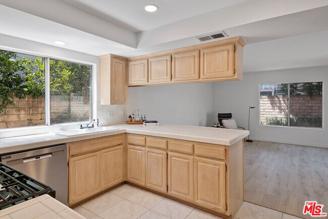 Building Photo - 8473 Penfield Ave