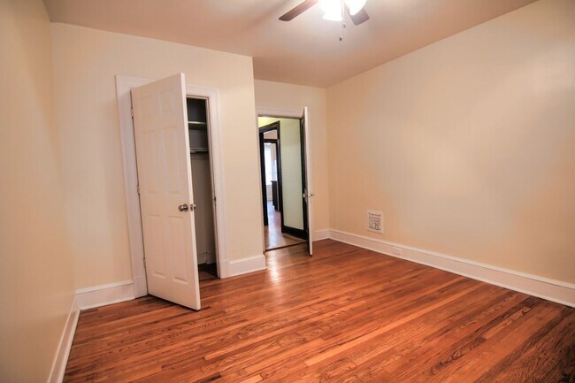 Building Photo - This 2 bedroom 1 bath home has been completely refinished with brilliant hardwood floors throughout!