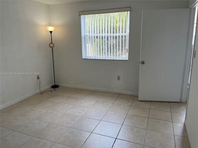 Building Photo - 8670 NW 6th Ln