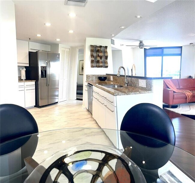 Building Photo - 5950 Pelican Bay Plaza S