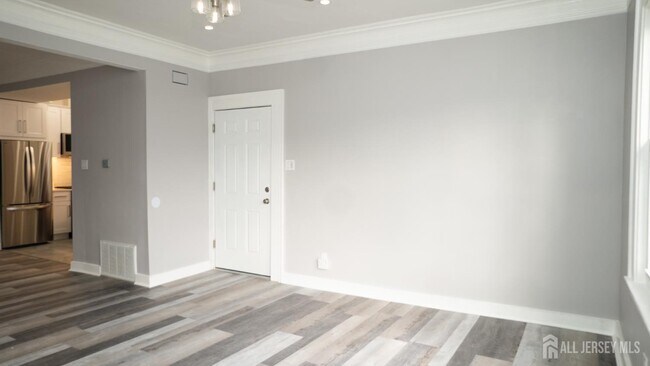 Building Photo - 65-65 Poe Ave