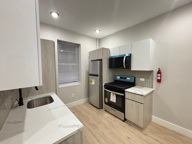 Building Photo - 5008 Palisade Ave