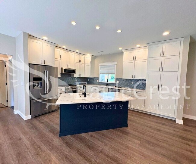 Building Photo - Contemporary Home With A Covered Patio & Quartz Countertops