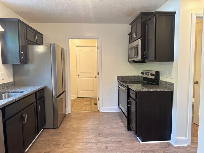 Building Photo - Move in Special! Beautiful Home Built in 2021! Open Floor Plan with 4bed/2.5 Bath and Fenced yard!