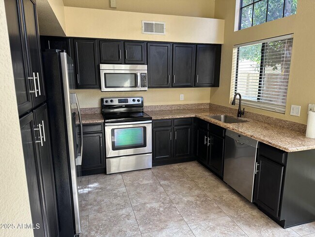 Building Photo - 8919 S Lori Ln