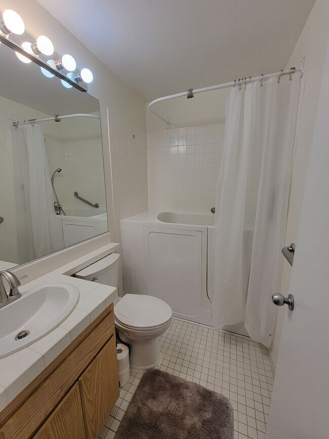 Building Photo - Spacious 2 Bed/2 Bath Condo in the Heart of La Mesa Village offering free COX Cable/WIFI