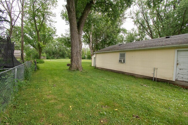 Building Photo - Charming 2BR Home On Spacious Lot With Garage And Shed