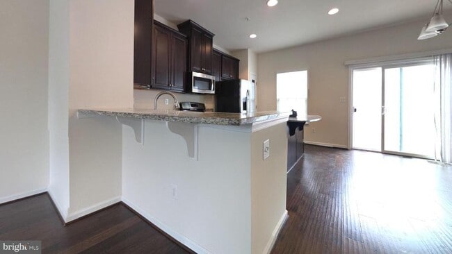 Building Photo - 7209 Strawberry Fields Way