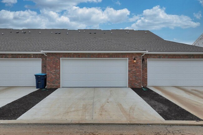 Building Photo - **BE THE LUCKY ONE TO LIVE IN THIS 2024-BUILT BRICK TOWNHOME IN THE VILLAS AT REGAL SQUARE FEATUR...